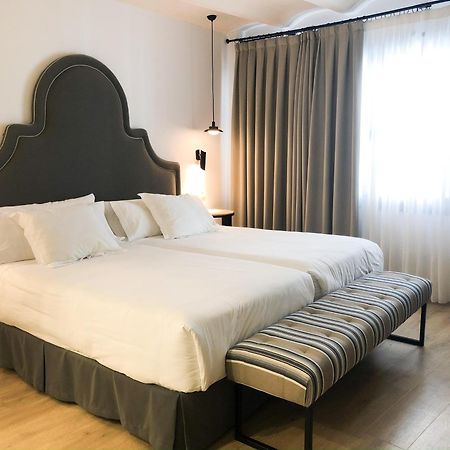Apartamentos Hom Sevilla Sevilha Exterior foto